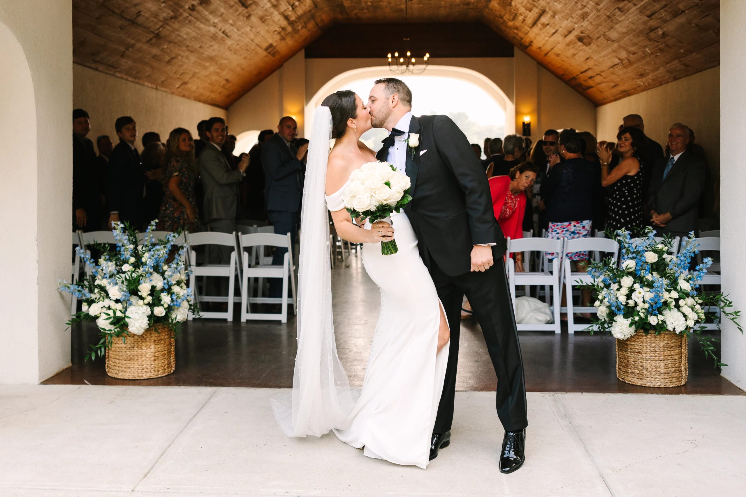 Wedding couple in the open-air Boat House pavilion at Lake Pearl Wrentham