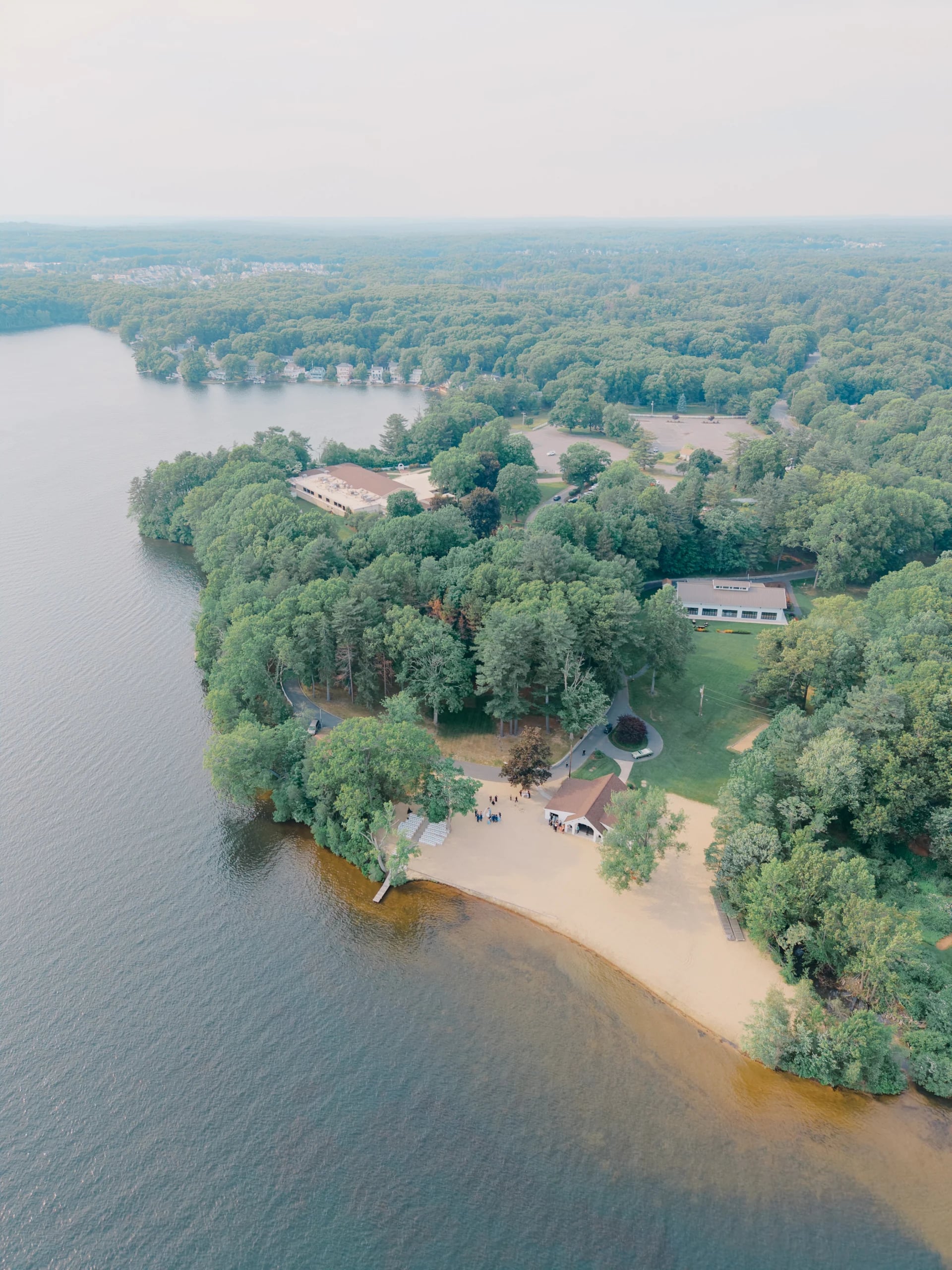 Aerial view of the private beach and 25-acre lake at Lake Pearl Wrentham